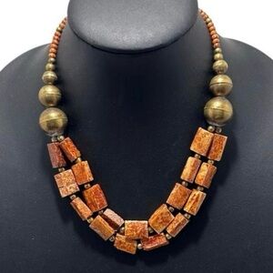 Vtg Beaded Necklace Women's OS Orange
Brown Double Strand
Wooden Beads And Brass